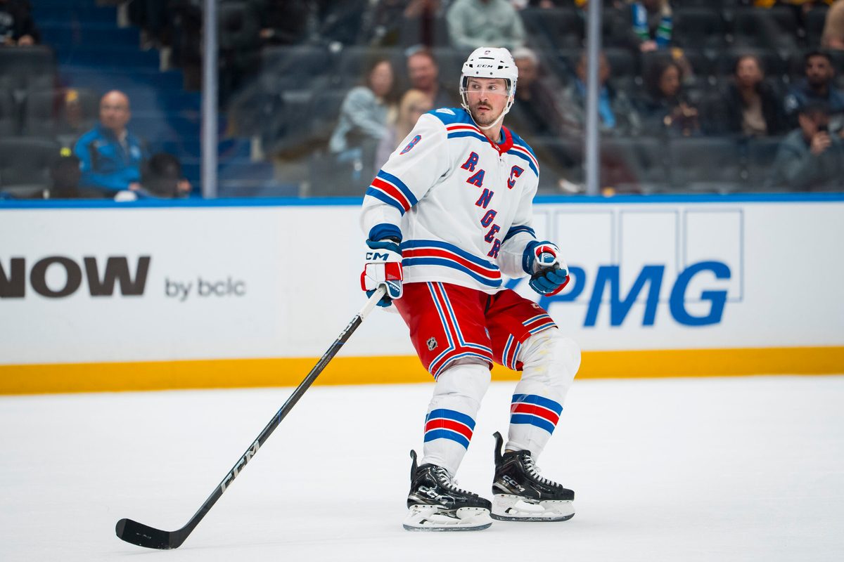 Oct 28, 2025; Vancouver, British Columbia, CAN; New York Rangers forward J.T. Miller (8) skates against the Vancouver Canucks in the third period at Rogers Arena. Mandatory Credit: Bob Frid-Imagn Images
