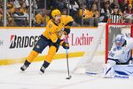 Oct 28, 2025; Nashville, Tennessee, USA;  Nashville Predators left wing Filip Forsberg (9) skates behind the net against the Tampa Bay Lightning during the third period at Bridgestone Arena. Mandatory Credit: Steve Roberts-Imagn Images