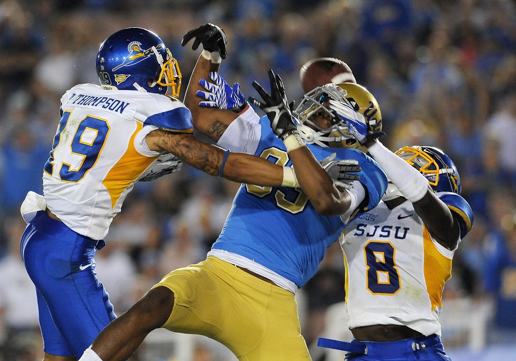 Sep 10, 2011; Pasadena, CA, USA; San Jose State Spartans cornerback Peyton Thompson (19) and cornerback Brandon Driver (8) break up a pass intended for UCLA Bruins wide receiver Nelson Rosario (83) during the 4th quarter in the end zone at the Rose Bowl. UCLA won 27-17. Mandatory Credit: Jayne Kamin-Oncea-Imagn Images