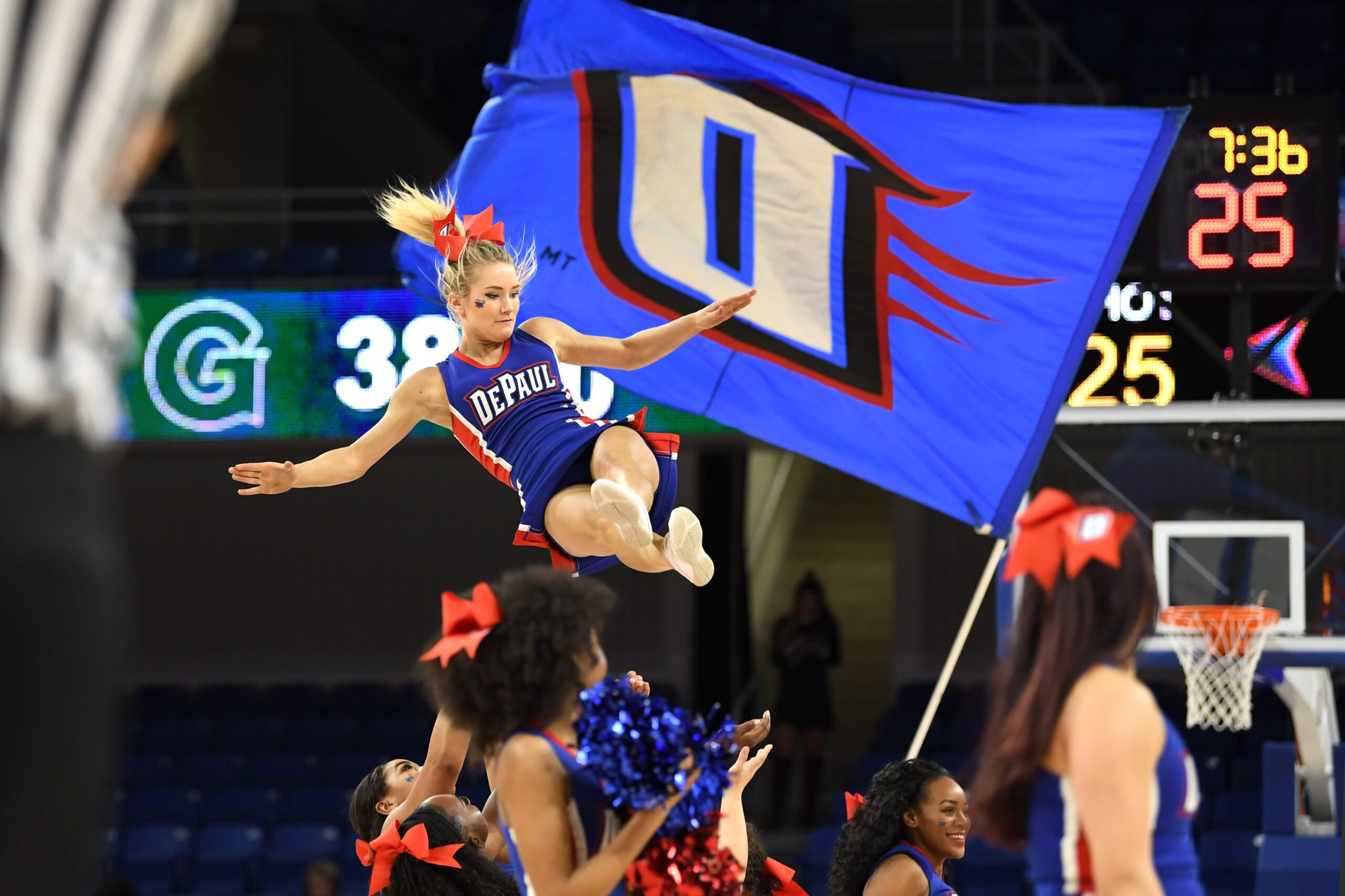 Mar 5, 2018; Chicago, IL, USA; DePaul Blue Demons cheerleaders perform during a stoppage in play in the second half of a semifinal game against the Georgetown Hoyas in the women's Big East Conference tournament at the Wintrust Arena. Mandatory Credit: Patrick Gorski-Imagn Images