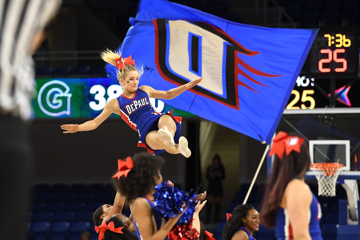 Mar 5, 2018; Chicago, IL, USA; DePaul Blue Demons cheerleaders perform during a stoppage in play in the second half of a semifinal game against the Georgetown Hoyas in the women's Big East Conference tournament at the Wintrust Arena. Mandatory Credit: Patrick Gorski-Imagn Images