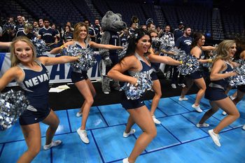 Mar 15, 2018; Nashville, TN, USA; The Nevada Wolf Pack cheerleaders perform during practice the day before the first round of the 2018 NCAA Tournament at Bridgestone Arena. Mandatory Credit: Christopher Hanewinckel-Imagn Images