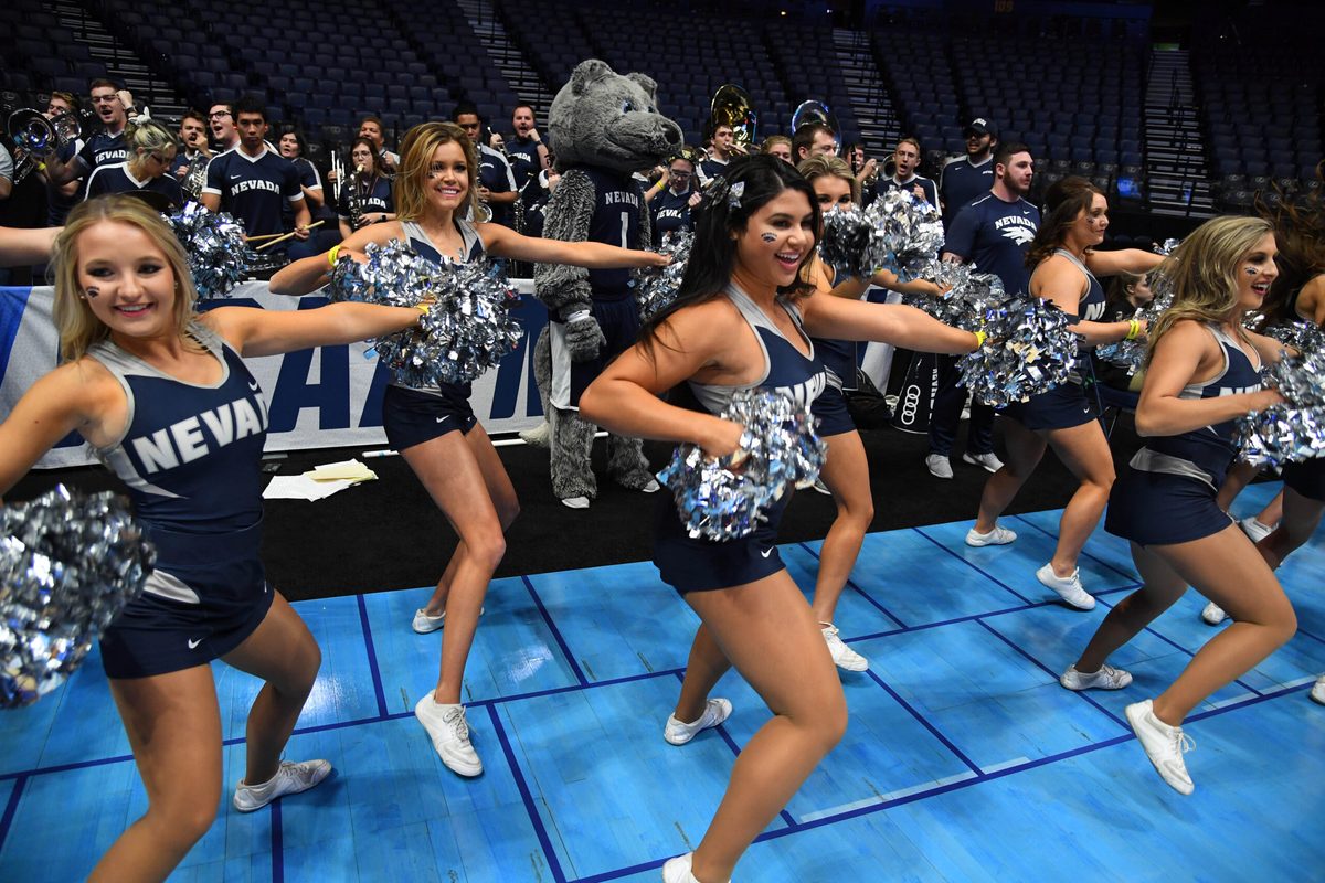 Mar 15, 2018; Nashville, TN, USA; The Nevada Wolf Pack cheerleaders perform during practice the day before the first round of the 2018 NCAA Tournament at Bridgestone Arena. Mandatory Credit: Christopher Hanewinckel-Imagn Images