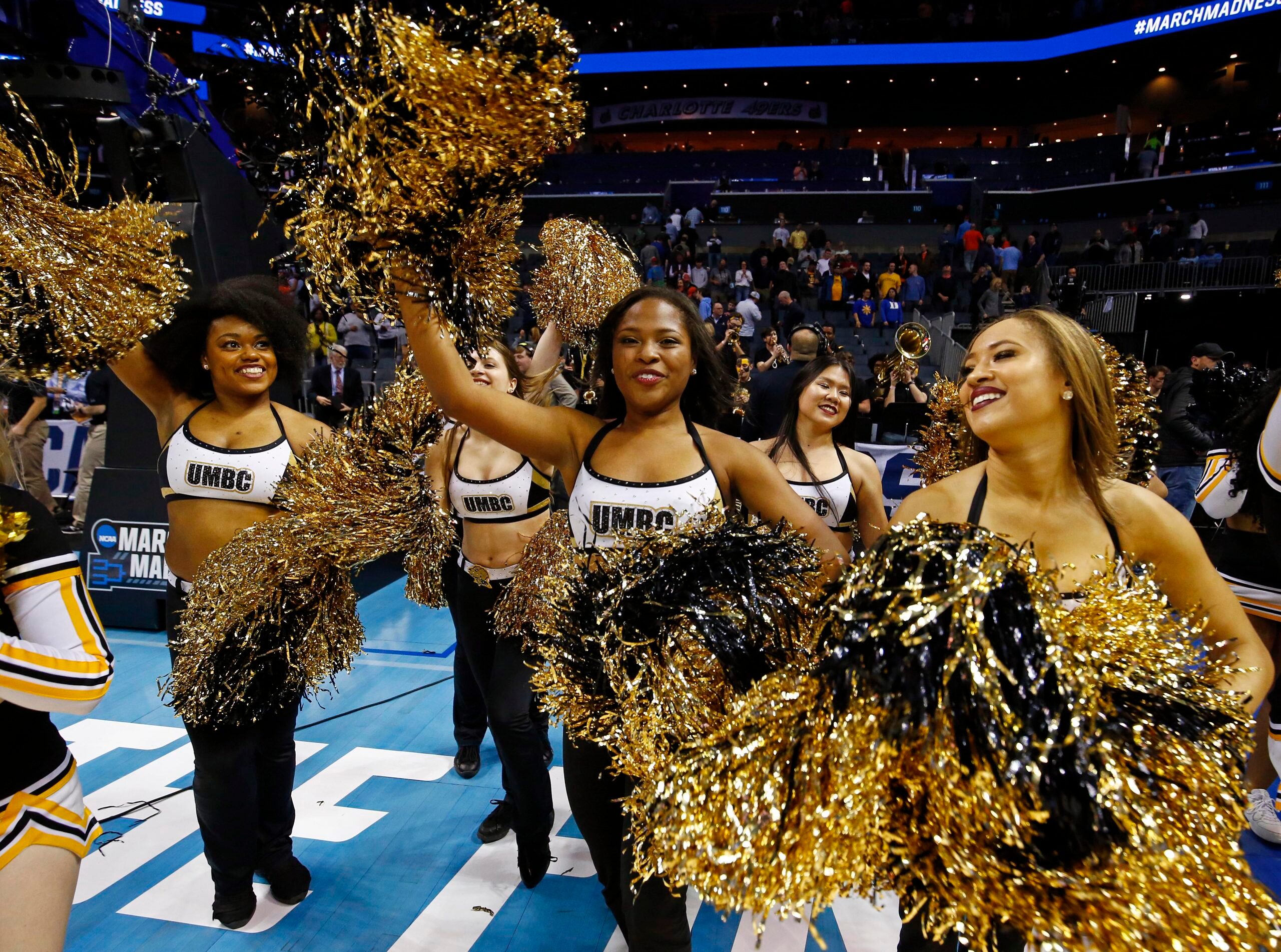 Mar 16, 2018; Charlotte, NC, USA; The UMBC Retrievers cheerleader after the game against Virginia Cavaliers in the first round of the 2018 NCAA Tournament at Spectrum Center. Mandatory Credit: Jeremy Brevard-Imagn Images