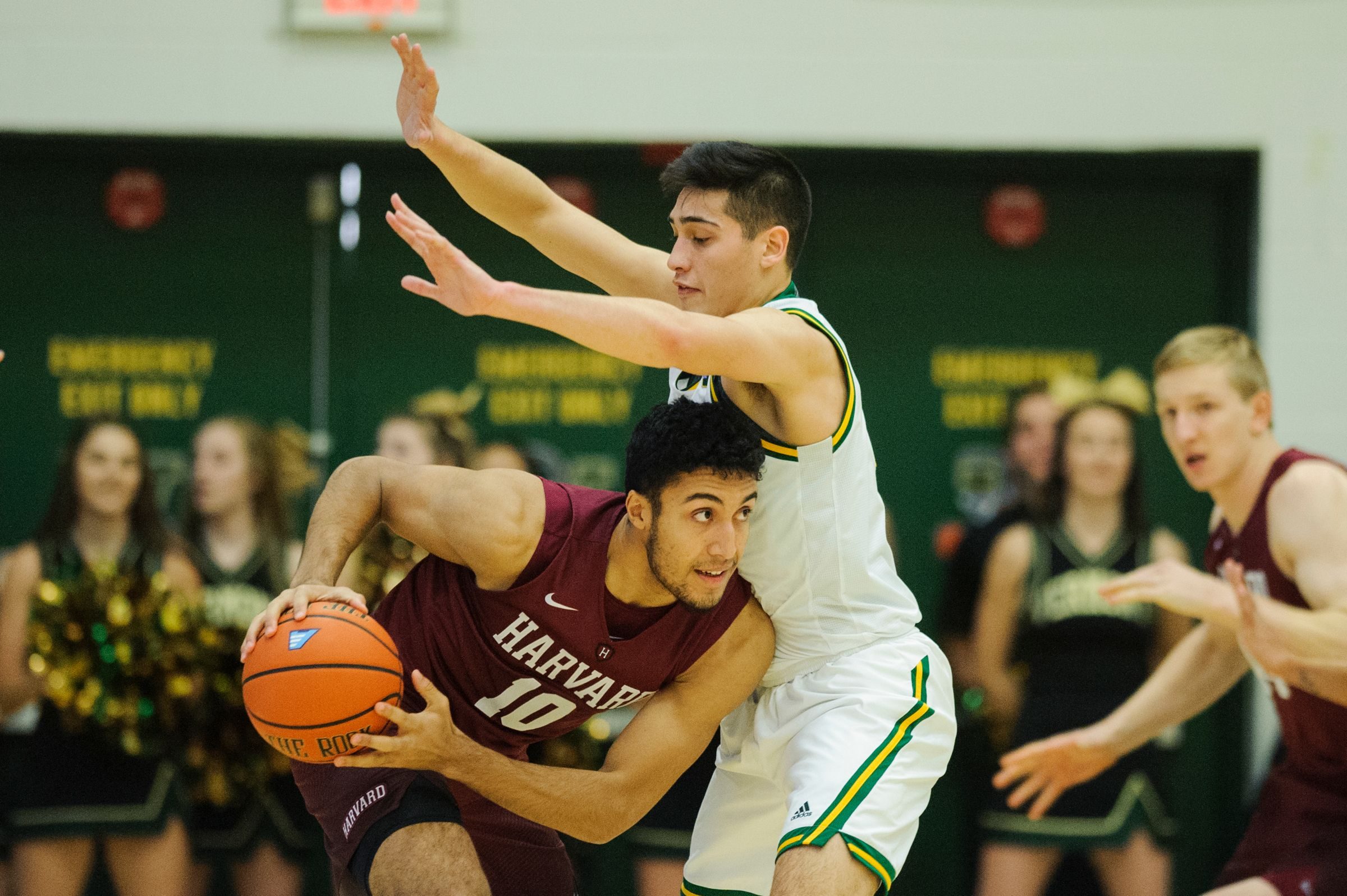 Vermont guard Robin Duncan (4) guards Harvard's Noah Kirkwood (10) during the men's basketball between the Harvard Crimson and the Vermont Catamounts at Patrick Gym on Saturday night December 8, 2018 in Burlington.

Harvard Vs Vermont Men S Basketball 12 8 18