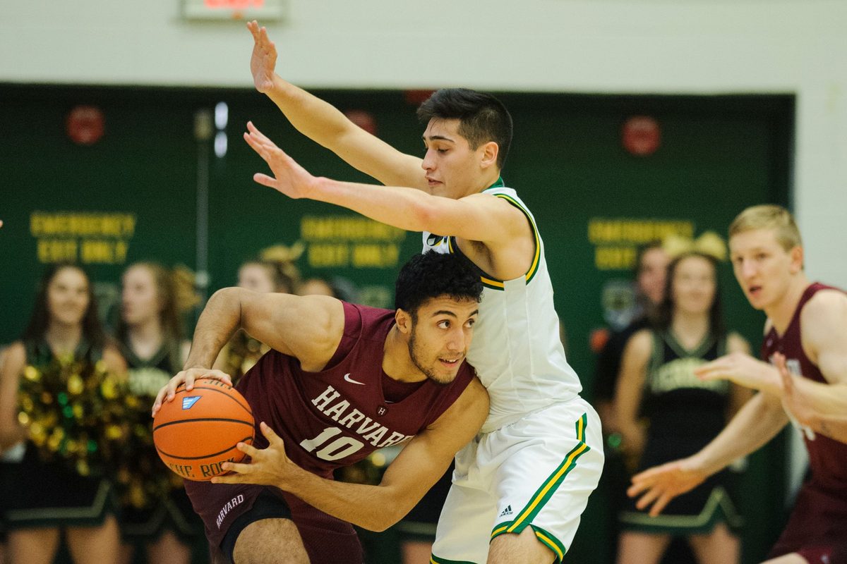 Vermont guard Robin Duncan (4) guards Harvard's Noah Kirkwood (10) during the men's basketball between the Harvard Crimson and the Vermont Catamounts at Patrick Gym on Saturday night December 8, 2018 in Burlington.
Harvard Vs Vermont Men S Basketball 12 8 18