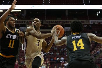 Florida State Seminoles guard Trent Forrest (3) drives the ball to the hoop while Winthrop Eagles guard Charles Falden (11) and Winthrop Eagles guard Adam Pickett (14) try to stop him from scoring. The Florida State Seminoles host the Winthrop Eagles for men's basketball at the Tucker Civic Center, Tuesday, Jan. 1, 2019.

Fsu V Winthrop321