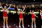 Jan 29, 2020; Albuquerque, New Mexico, USA;  The New Mexico State cheerleading squad perform during a timeout as the Lobos face the San Diego State Aztecs during the second half at Dreamstyle Arena. Mandatory Credit: Ivan Pierre Aguirre-Imagn Images