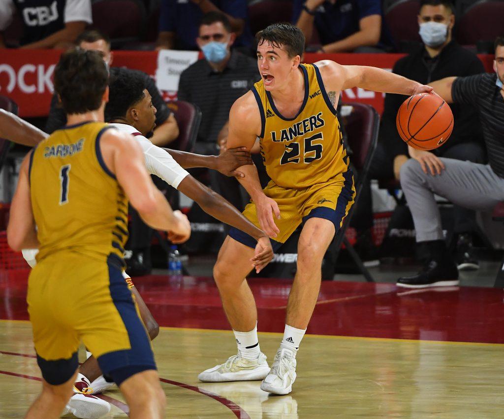 Nov 25, 2020; Los Angeles, California, USA; California Baptist Lancers guard Ty Rowell (25) drives against the USC Trojans in the second half at the Galen Center. Mandatory Credit: Jayne Kamin-Oncea-Imagn Images