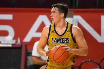 Nov 25, 2020; Los Angeles, California, USA;  California Baptist Lancers guard Ty Rowell (25) controls the ball against the USC Trojans in the second half at the Galen Center. Mandatory Credit: Jayne Kamin-Oncea-Imagn Images