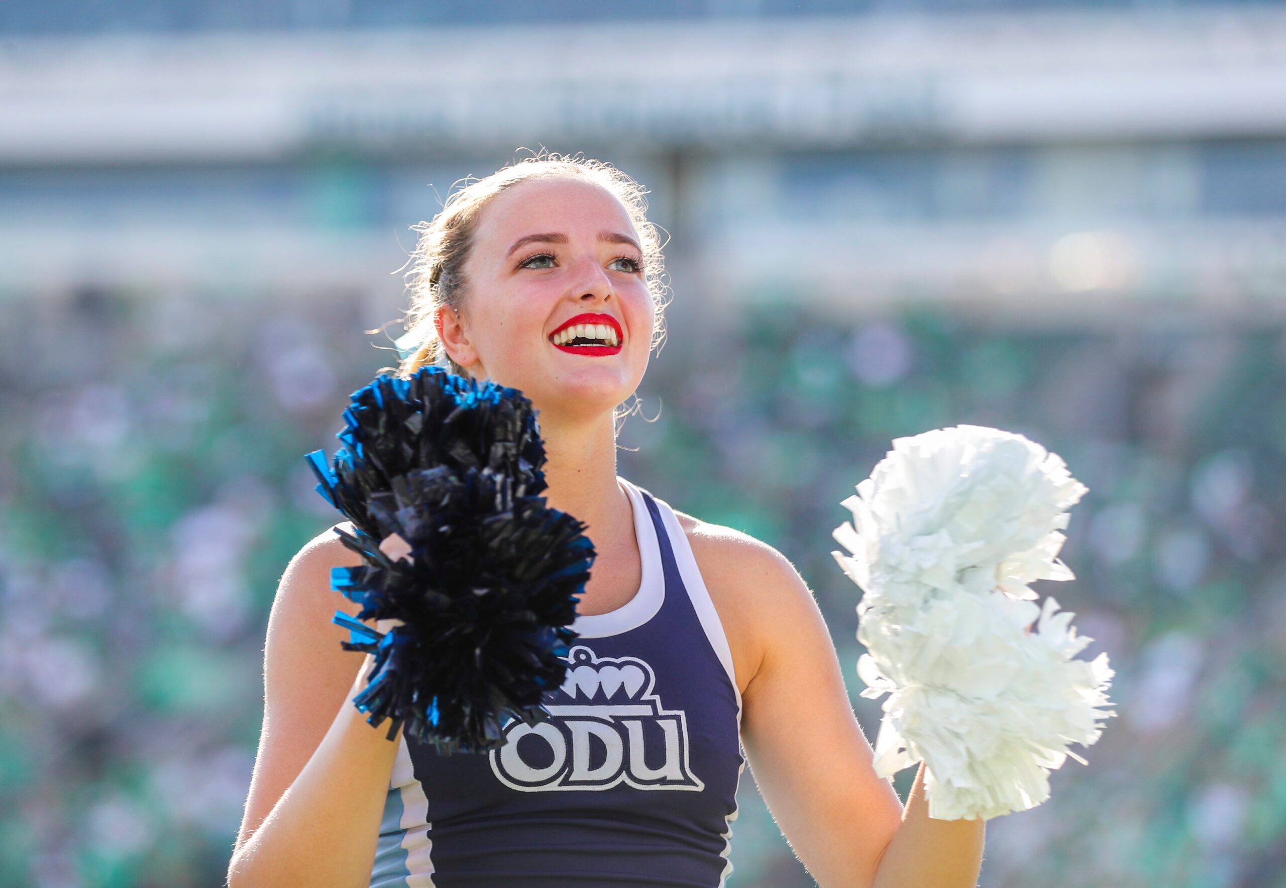 Oct 9, 2021; Huntington, West Virginia, USA; A Old Dominion Monarchs cheerleader performs during the third quarter against the Marshall Thundering Herd at Joan C. Edwards Stadium. Mandatory Credit: Ben Queen-Imagn Images