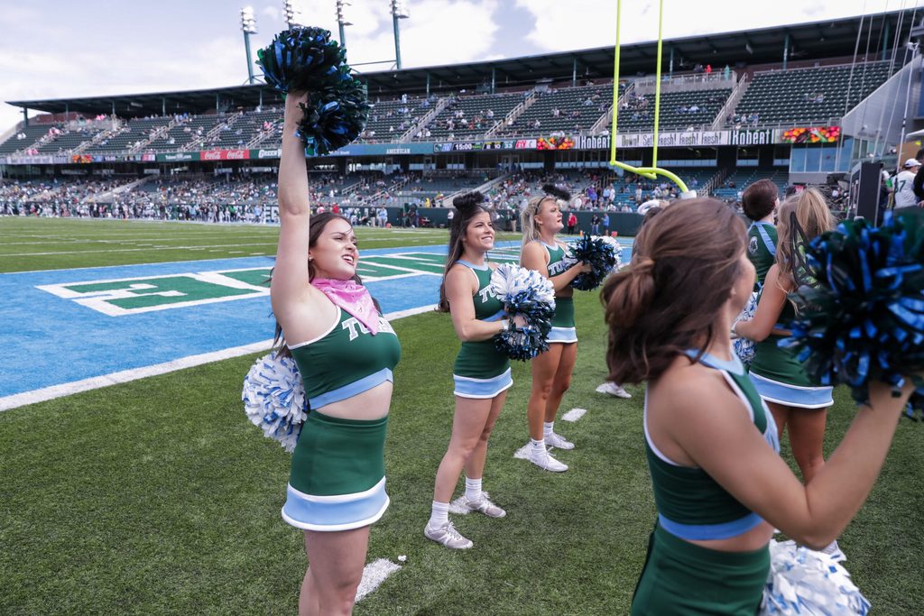 Oct 30, 2021; New Orleans, Louisiana, USA; Tulane Green Wave cheerleaders entertain the fans against Cincinnati Bearcats during the second half at Yulman Stadium. Mandatory Credit: Stephen Lew-Imagn Images