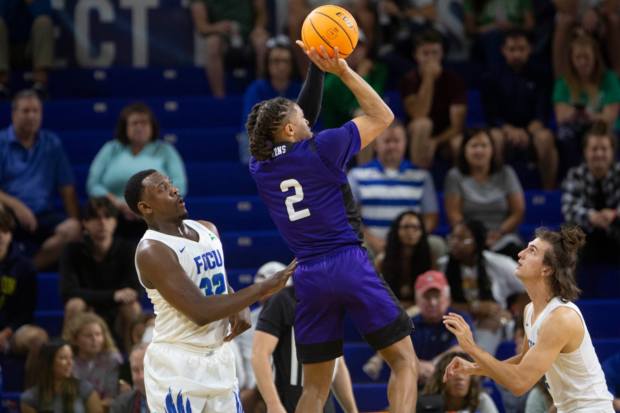 North Alabama Lions guard Daniel Ortiz (2) shoots over Florida Gulf Coast Eagles guard Caleb Catto (2) during the 2022 ASUN Men   s Basketball Championship first-round matchup between the North Alabama Lions and Florida Gulf Coast Eagles, Tuesday, March 1, 2022, at Alico Arena in Fort Myers, Fla.The Florida Gulf Coast Eagles defeated North Alabama Lions 81-72.

North Alabama at FGCU, 2022 ASUN Men's Basketball Championship First Round