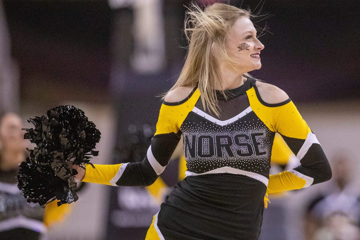A Northern Kentucky Norse cheerleader works through a timeout, Monday, March 7, 2022, during Horizon League tournament men s semifinal action from Indianapolis Indiana Farmers Coliseum. NKU won 57-43.