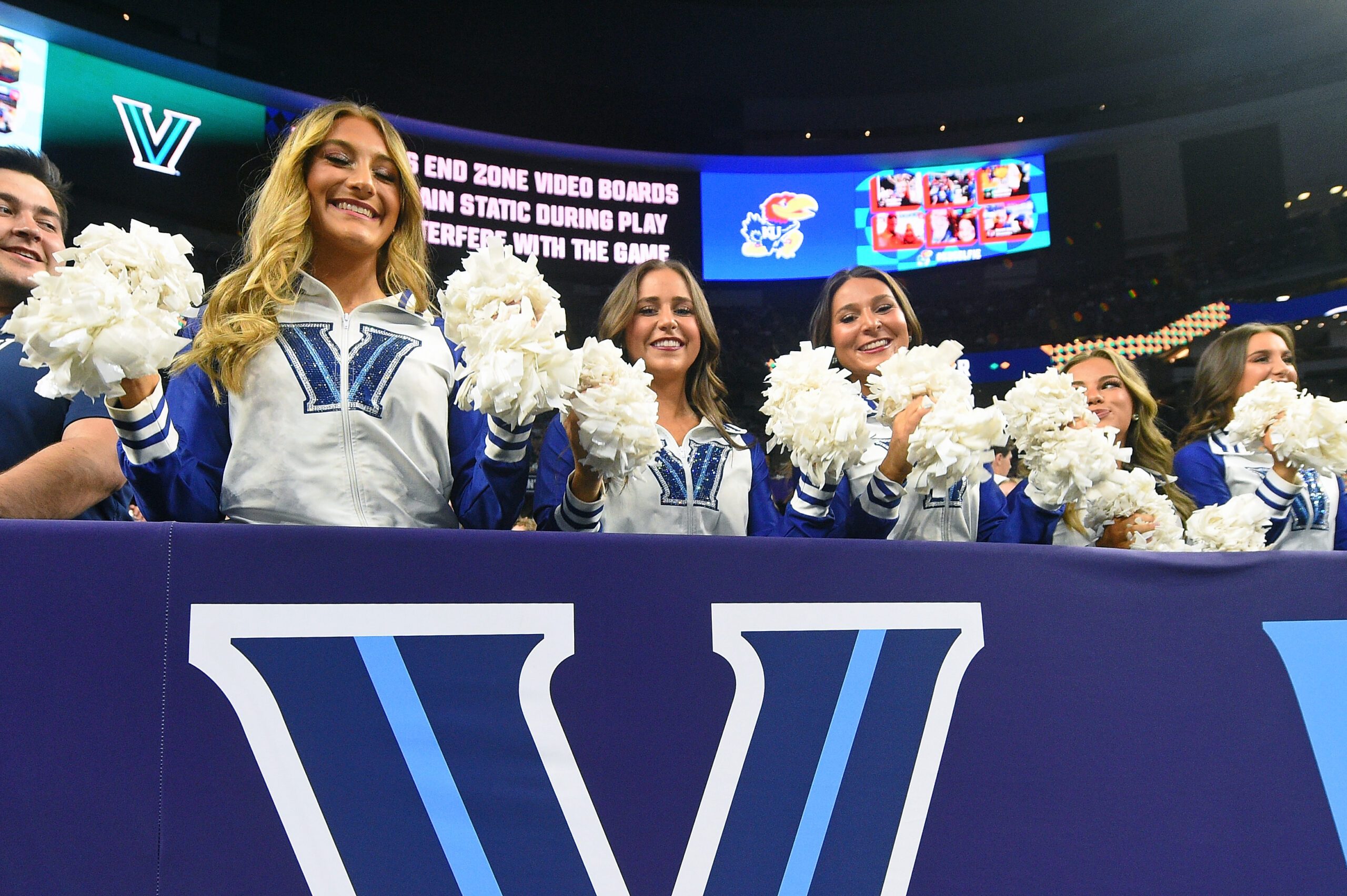 Apr 2, 2022; New Orleans, LA, USA; The Villanova Wildcats cheerleaders before the game against the Kansas Jayhawks during the 2022 NCAA men's basketball tournament Final Four semifinals at Caesars Superdome. Mandatory Credit: Bob Donnan-Imagn Images