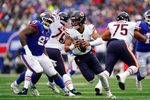 Chicago Bears quarterback Justin Fields (1) scrambles against the New York Giants in the second half. The Giants defeat the Bears, 20-12, at MetLife Stadium on Sunday, Oct. 2, 2022, in East Rutherford.

Nfl Ny Giants Vs Chicago Bears