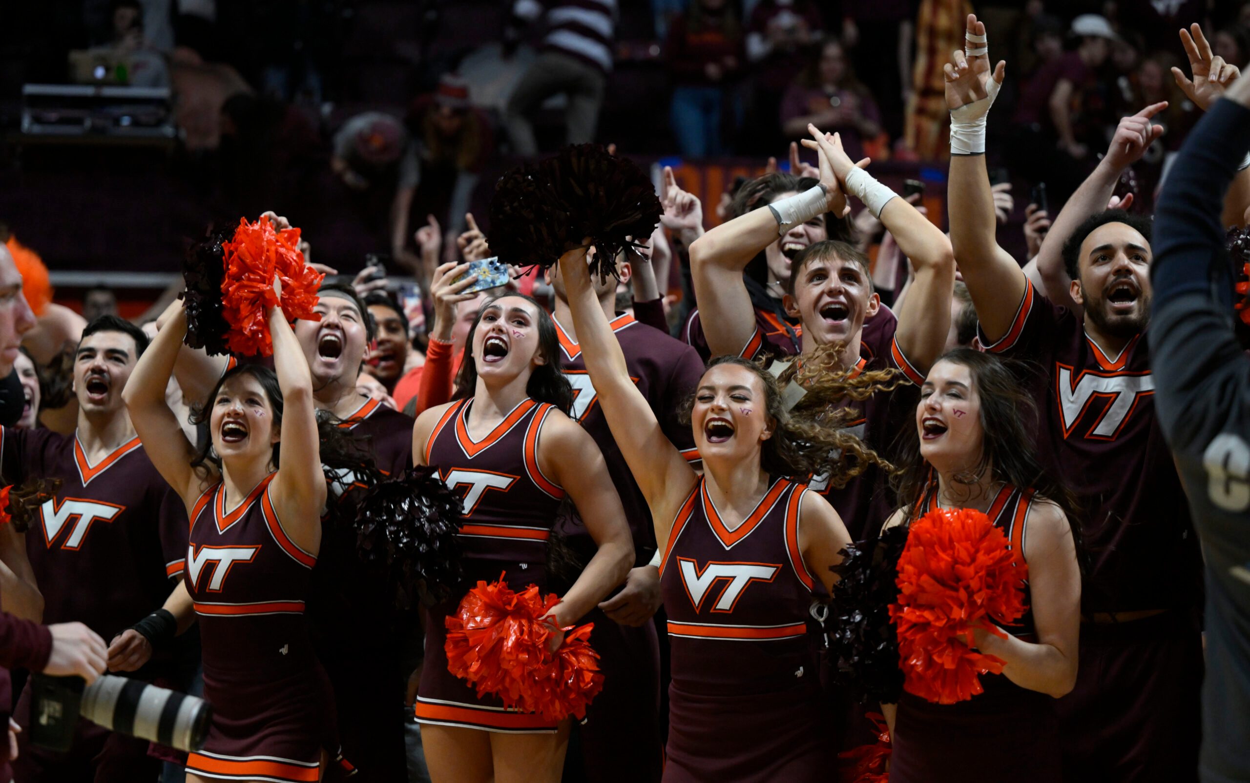 Feb 4, 2023; Blacksburg, Virginia, USA;  The Virginia Tech Hokies cheerleaders gather on the court after the win against the Virginia Cavaliers at Cassell Coliseum. Mandatory Credit: Lee Luther Jr.-Imagn Images
