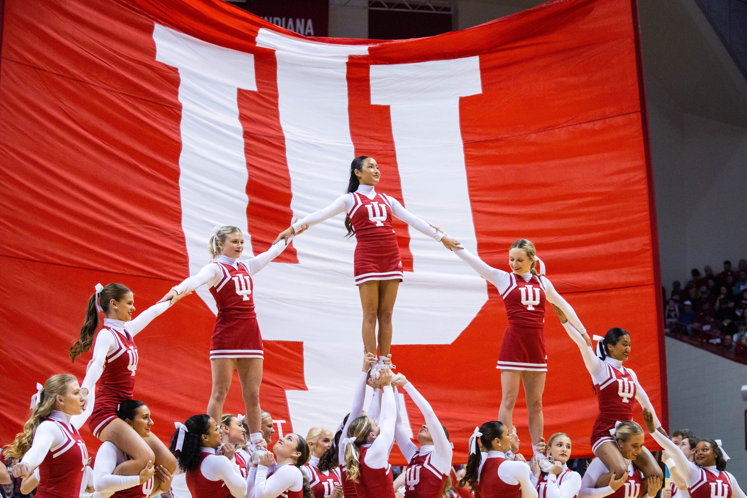 Feb 7, 2023; Bloomington, Indiana, USA; Indiana Hoosiers cheerleaders in the first half against the Rutgers Scarlet Knights at Simon Skjodt Assembly Hall. Mandatory Credit: Trevor Ruszkowski-Imagn Images
