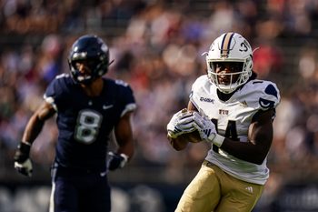 Sep 16, 2023; East Hartford, Connecticut, USA; FIU Golden Panthers wide receiver Jalen Bracey (14) makes the catch and runs the ball for a touchdown against the UConn Huskies in the second quarter at Rentschler Field at Pratt & Whitney Stadium. Mandatory Credit: David Butler II-Imagn Images