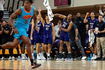 Abilene Christian forward Cameron Steele (5), guard Hunter Jack Madden (21), guard Immanuel Allen (25) and guard Nasir DeGruy (10) celebrate on the second half of an NCAA men  s college basketball game Monday, Nov. 6, 2023., in Stillwater, Okla. (Mitch Alcala for the Oklahoman)