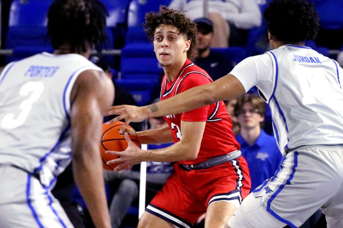 Belmont guard Keishawn Davidson (3) looks to pass the ball as he brings the ball up the court and Middle Tennessee guard Jestin Porter (3) and Middle Tennessee guard Jalen Jordan (14) guard him during the men s basketball game on Saturday, Dec. 9, 2023, at MTSU..