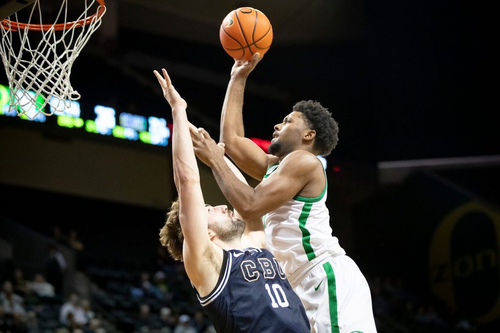 Oregon guard Kario Oquendo puts up a shot as the Oregon Ducks host California Baptist Tuesday, Dec. 12, 2023, at Matthew Knight Arena in Eugene, Ore.