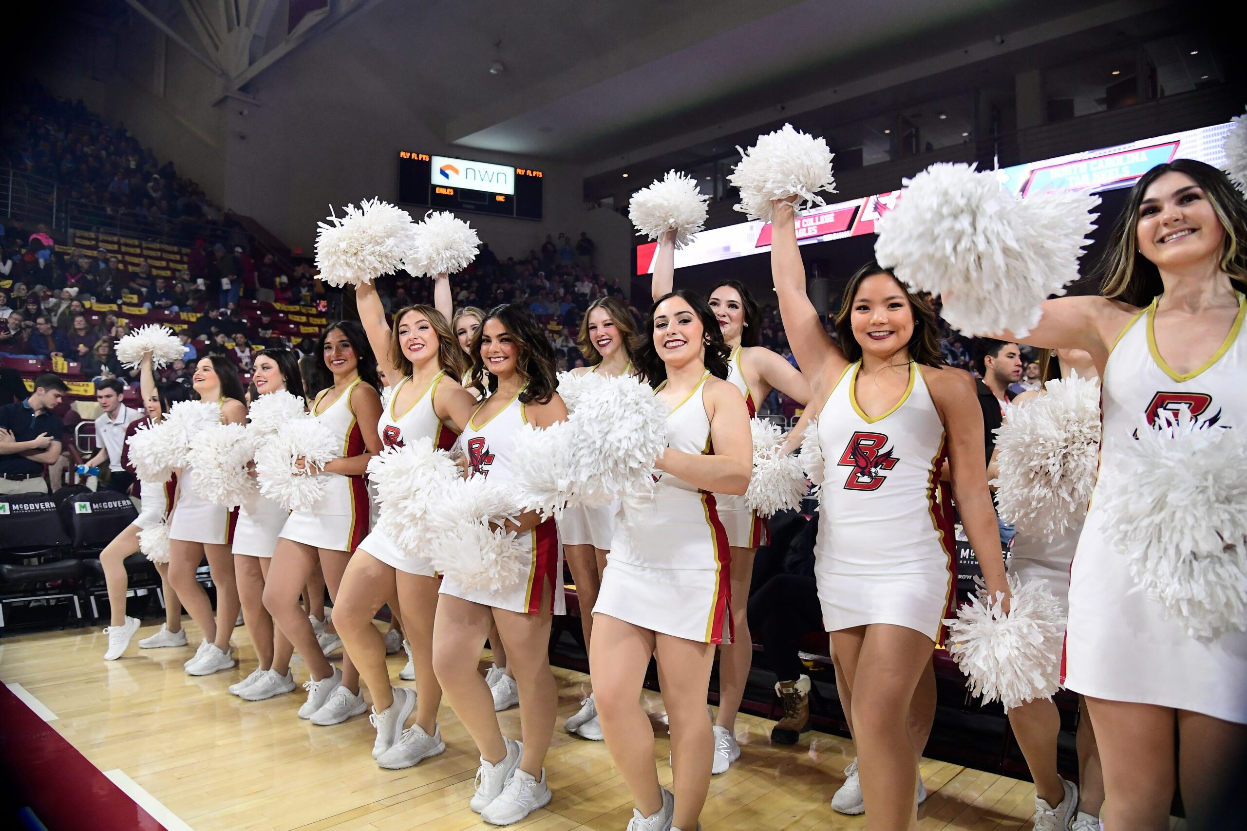 Jan 20, 2024; Chestnut Hill, Massachusetts, USA; The Boston College Eagles cheerleaders entertain fans before a game against the North Carolina Tar Heels at Conte Forum. Mandatory Credit: Eric Canha-Imagn Images