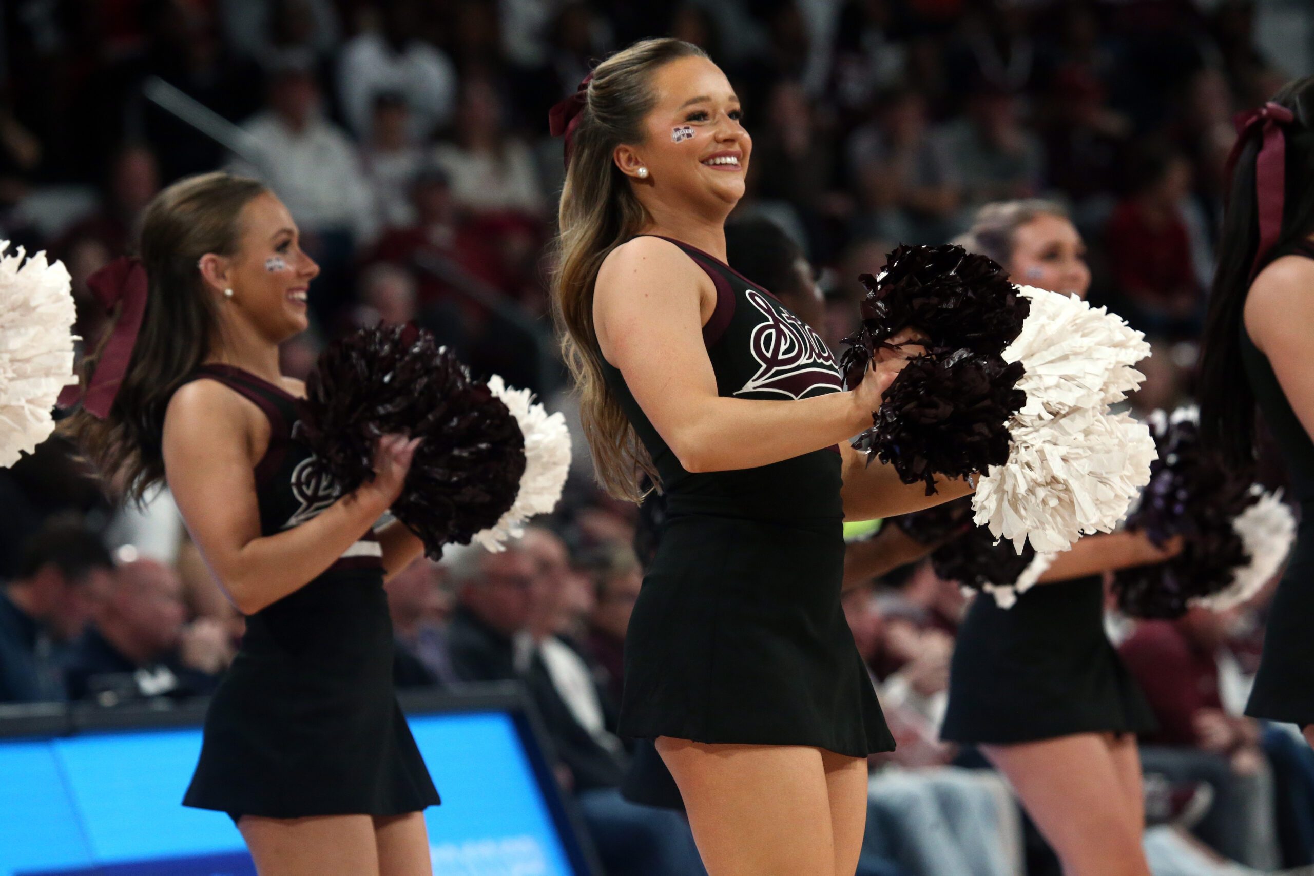 Feb 21, 2024; Starkville, Mississippi, USA; Mississippi State Bulldogs cheerleaders preform during the second half against the Mississippi Rebels at Humphrey Coliseum. Mandatory Credit: Petre Thomas-Imagn Images