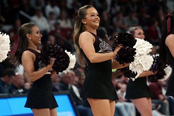 Feb 21, 2024; Starkville, Mississippi, USA; Mississippi State Bulldogs cheerleaders preform during the second half against the Mississippi Rebels at Humphrey Coliseum. Mandatory Credit: Petre Thomas-Imagn Images