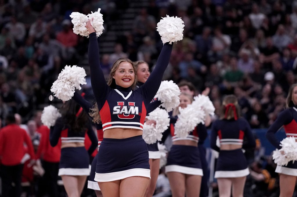 Mar 21, 2024; Salt Lake City, UT, USA; Samford Bulldogs cheerleaders during the first half in the first round of the 2024 NCAA Tournament against the Kansas Jayhawks at Vivint Smart Home Arena-Delta Center. Mandatory Credit: Gabriel Mayberry-Imagn Images