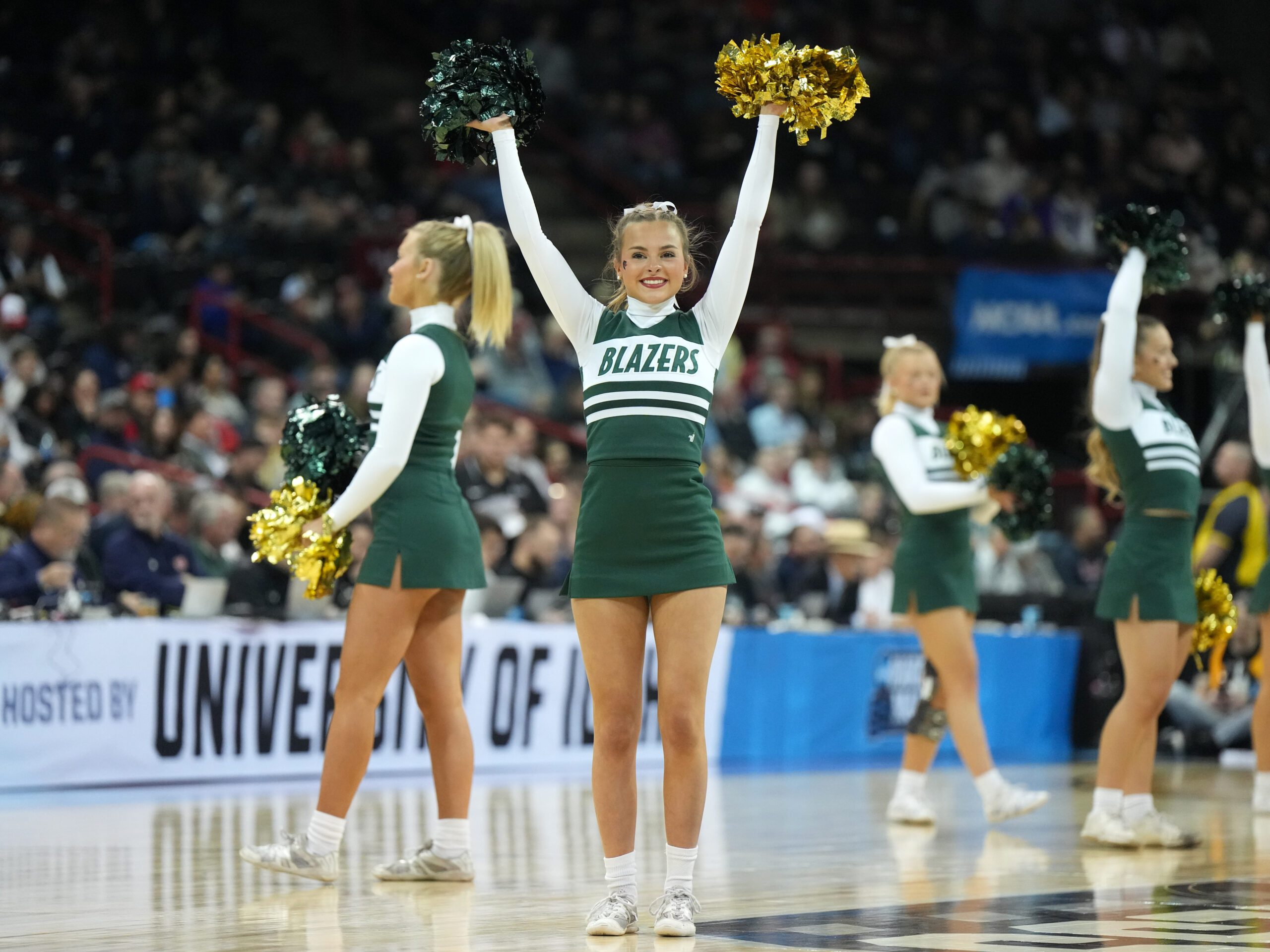 Mar 22, 2024; Spokane, WA, USA; UAB Blazers cheerleaders perform during the first half of a game against the San Diego State Aztecs in the first round of the 2024 NCAA Tournament at Spokane Veterans Memorial Arena. Mandatory Credit: Kirby Lee-Imagn Images