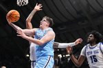 Indiana State Sycamores center Robbie Avila (21) goes in for a lay-up Thursday, April 4, 2024, during the NIT championship game at Hinkle Fieldhouse in Indianapolis. The Seton Hall Pirates defeated the Indiana State Sycamores, 79-77.