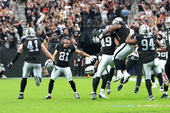 Sep 29, 2024; Paradise, Nevada, USA; The Las Vegas Raiders celebrate after stopping the Cleveland Browns on fourth down in the the fourth quarter at Allegiant Stadium. Mandatory Credit: Stephen R. Sylvanie-Imagn Images