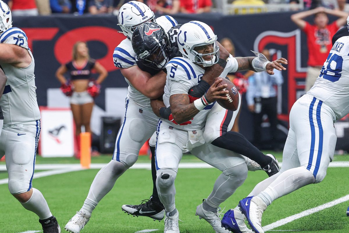 Oct 27, 2024; Houston, Texas, USA; Houston Texans defensive end Danielle Hunter (55) sacks Indianapolis Colts quarterback Anthony Richardson (5) during the fourth quarter at NRG Stadium. Mandatory Credit: Troy Taormina-Imagn Images
