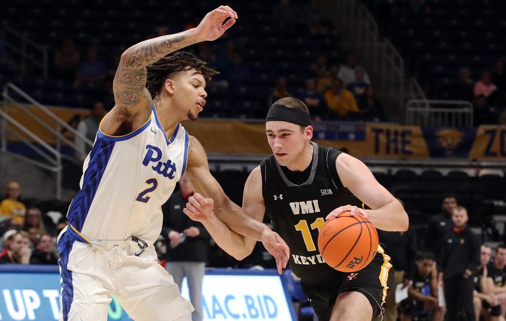 Nov 18, 2024; Pittsburgh, Pennsylvania, USA; Virginia Military Keydets forward Augustinas Kiudulas (11) goes to the basket against Pittsburgh Panthers forward Cameron Corhen (2) during the first half at the Petersen Events Center. Mandatory Credit: Charles LeClaire-Imagn Images