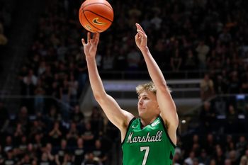 Marshall Thundering Herd guard Ryan Nutter (7) shoots the ball Saturday, Nov. 23, 2024, during the NCAA men’s basketball game against the Purdue Boilermakers at Mackey Arena in West Lafayette, Ind.