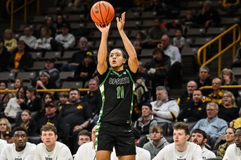 Nov 26, 2024; Iowa City, Iowa, USA; USC Upstate Spartans guard Karmani Gregory (11) shoots the ball against the Iowa Hawkeyes during the first half at Carver-Hawkeye Arena. Mandatory Credit: Jeffrey Becker-Imagn Images