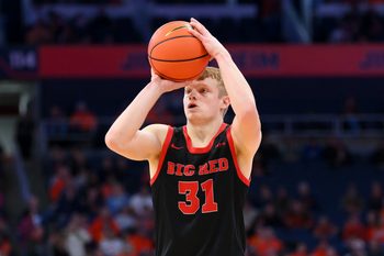 Nov 27, 2024; Syracuse, New York, USA; Cornell Big Red guard Cooper Noard (31) shoots the ball against the Syracuse Orange during the first half at the JMA Wireless Dome. Mandatory Credit: Rich Barnes-Imagn Images