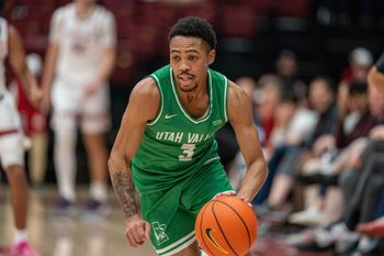 Dec 3, 2024; Stanford, California, USA; Utah Valley Wolverines guard Kylin Green (3) on a fast break to the basket against the Stanford Cardinal during the second half at Maples Pavilion. Mandatory Credit: Neville E. Guard-Imagn Images