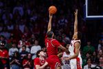 Dec 7, 2024; Tucson, Arizona, USA; Southern Utah Thunderbirds Jamir Simpson (3) shoots the ball while Arizona Wildcats guard Carter Bryant (9) attempts to block him during the second half at McKale Center. Mandatory Credit: Aryanna Frank-Imagn Images