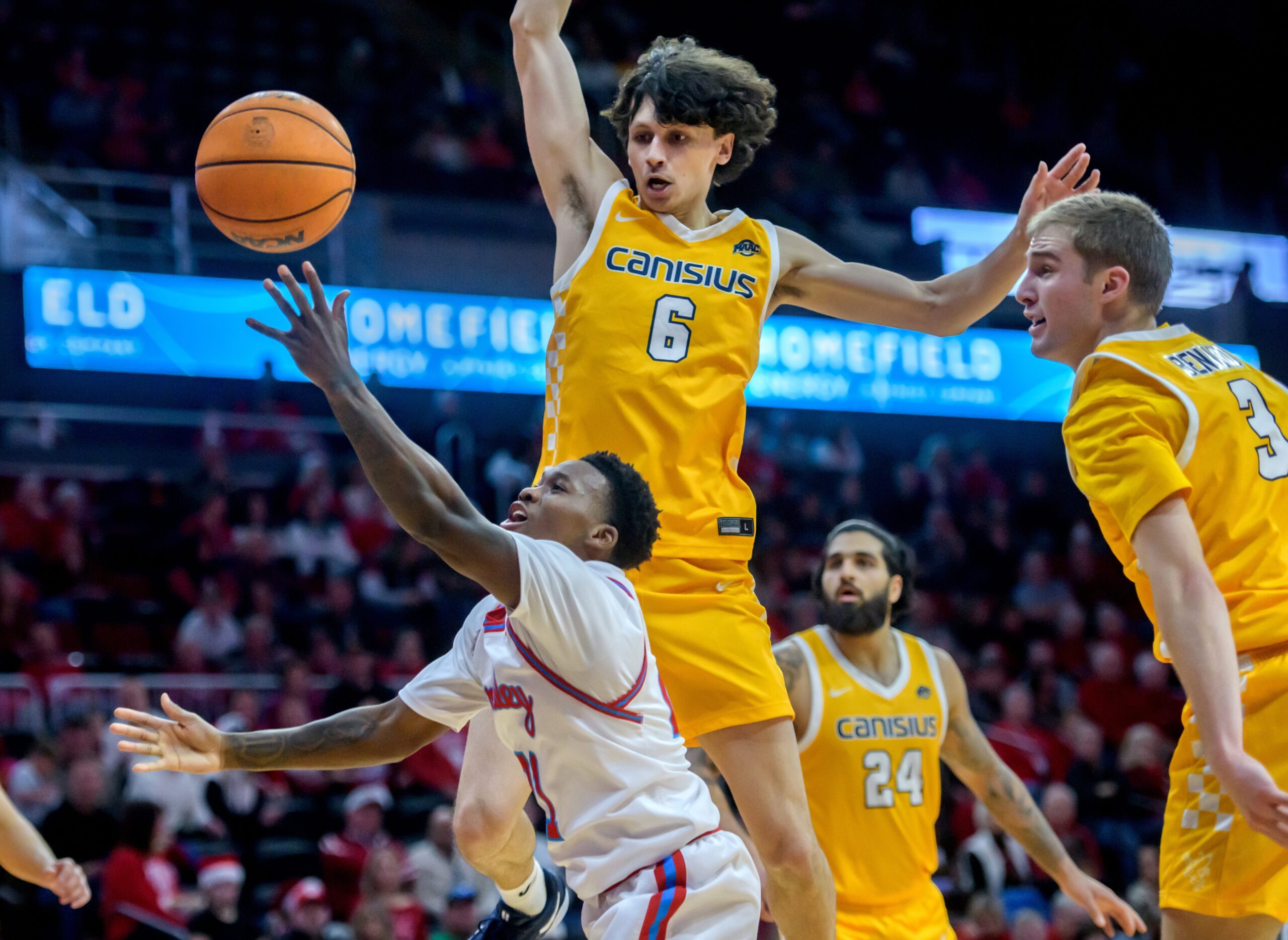 Bradley’s Duke Deen tries to get through the Canisius defense for a shot in the first half of their college basketball game Saturday, Dec. 21, 2024 at Carver Arena. The Braves routed the Golden Griffins 92-59.