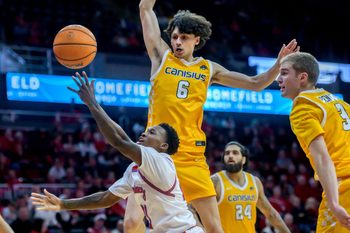 Bradley’s Duke Deen tries to get through the Canisius defense for a shot in the first half of their college basketball game Saturday, Dec. 21, 2024 at Carver Arena. The Braves routed the Golden Griffins 92-59.