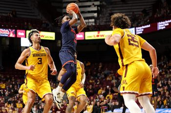 Dec 29, 2024; Minneapolis, Minnesota, USA; Morgan State Bears guard Rob Lawson (3) shoots against the Minnesota Golden Gophers during the second half at Williams Arena. Mandatory Credit: Matt Krohn-Imagn Images