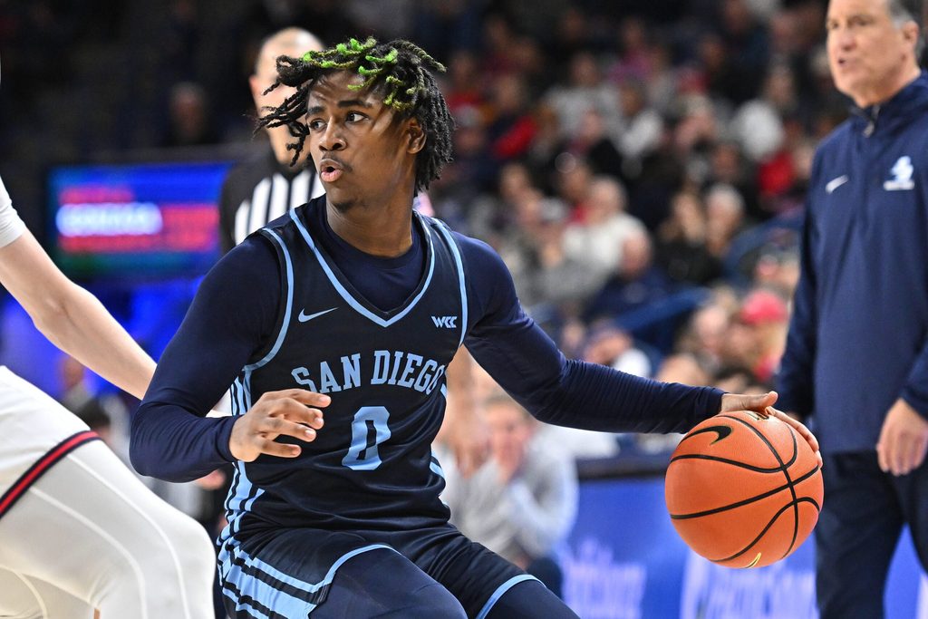 Jan 8, 2025; Spokane, Washington, USA; San Diego Toreros guard Kjay Bradley Jr. (0) controls the ball against the Gonzaga Bulldogs in the second half at McCarthey Athletic Center. Mandatory Credit: James Snook-Imagn Images