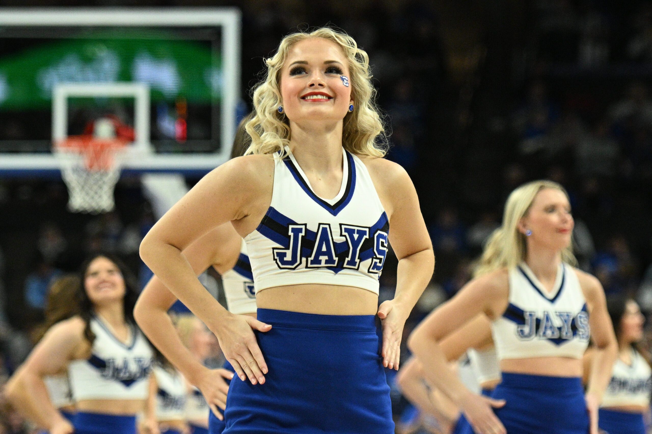 Jan 14, 2025; Omaha, Nebraska, USA;  Cheerleaders for the Creighton Bluejays perform during a break in the game against the Providence Friars during the second half at CHI Health Center Omaha. Mandatory Credit: Steven Branscombe-Imagn Images