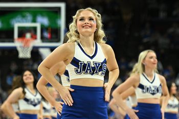 Jan 14, 2025; Omaha, Nebraska, USA;  Cheerleaders for the Creighton Bluejays perform during a break in the game against the Providence Friars during the second half at CHI Health Center Omaha. Mandatory Credit: Steven Branscombe-Imagn Images