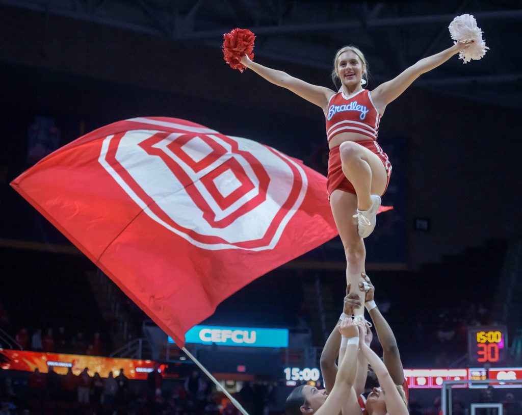 The Bradley cheerleaders entertain the crowd at halftime of an MVC college basketball game between the Braves and the Indiana State Sycamores on Wednesday, Jan. 15, 2025 at Carver Arena in Peoria. The Braves routed the Sycamores 118-65.