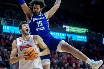 Bradley’s Ahmet Jonovic looks for a shot as Indiana State’s Markus Harding defends in the first half of their MVC college basketball game Wednesday, Jan. 15, 2025 at Carver Arena in Peoria. The Braves routed the Sycamores 118-65.