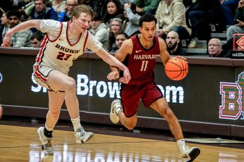 David Rochester chases down Harvard's Evan Nelson