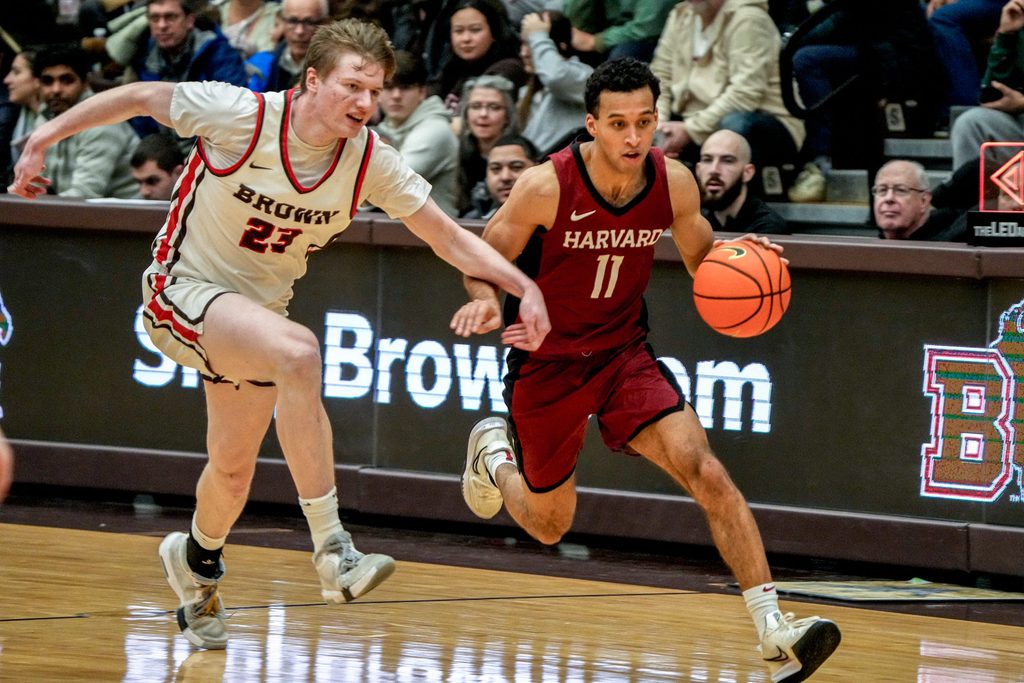 David Rochester chases down Harvard's Evan Nelson